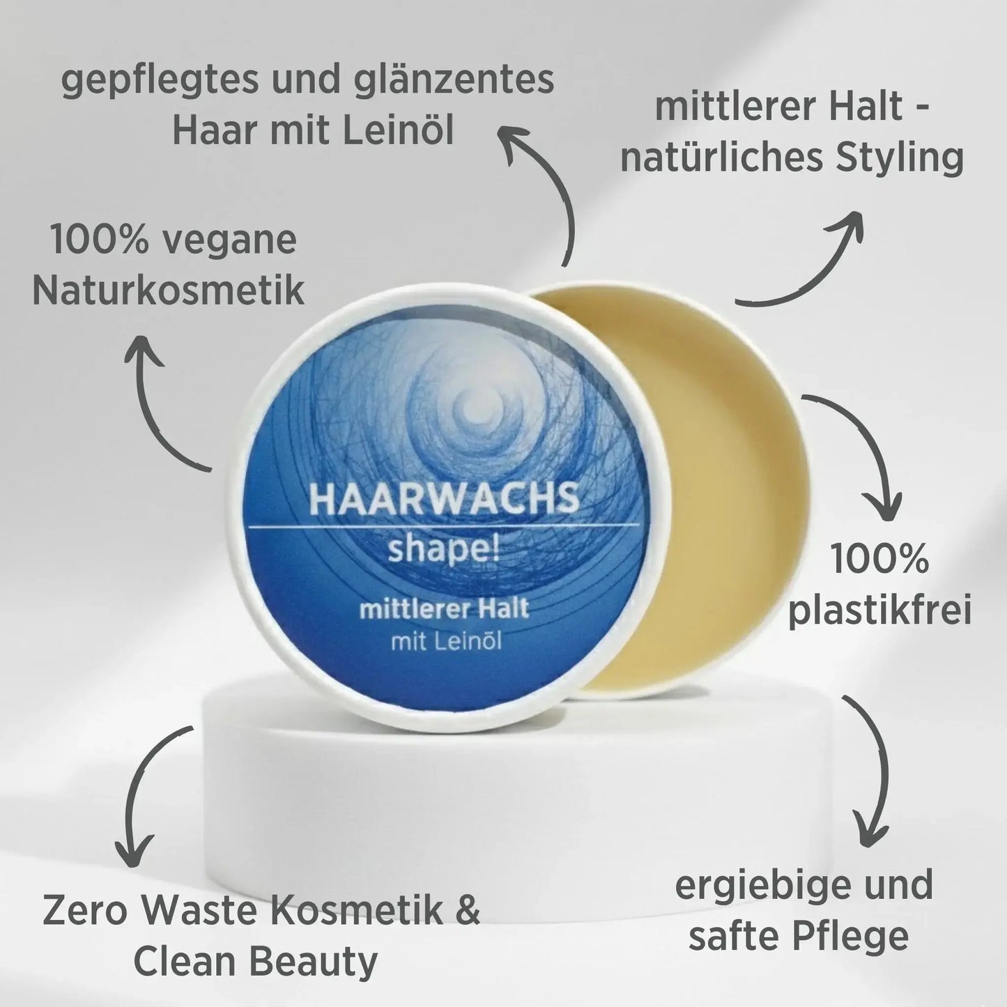 Haarwachs mit natürlichen Inhaltsstoffen für mittleren Halt mit Leinöl, Gesichtsbalsam ist in weißem, zylindrischem Karton verpackt mit blauem Etikett, zudem sind detaillierte Produktinformationen am Bild zu lesen.