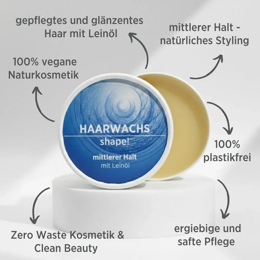 Haarwachs mit natürlichen Inhaltsstoffen für mittleren Halt mit Leinöl, Gesichtsbalsam ist in weißem, zylindrischem Karton verpackt mit blauem Etikett, zudem sind detaillierte Produktinformationen am Bild zu lesen.