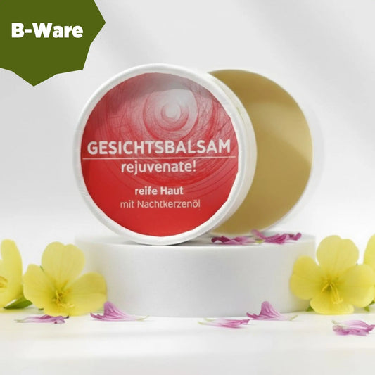 Gesichtsbalsam mit natürlichen Inhaltsstoffen für reife Haut mit Nachtkerzenöl, Gesichtsbalsam ist in weißem, zylindrischem Karton verpackt mit rotem Etikett. B-Ware.