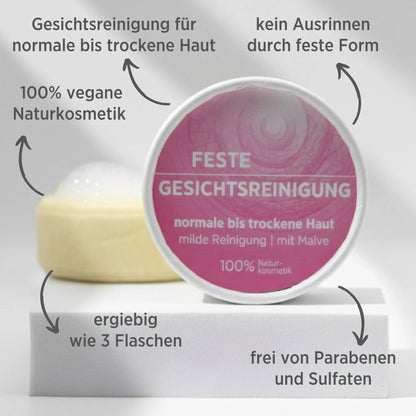 Feste Gesichtsreinigung für normale bis trockene Haut von Sonnengrün auf weißem Podest – natürliche, vegane und plastikfreie Gesichtspflege