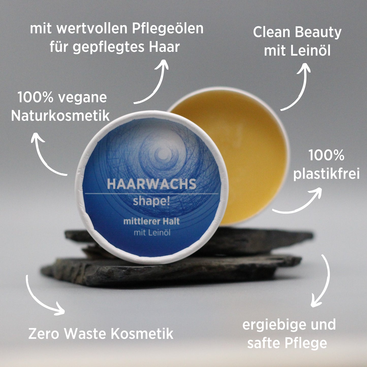 Haarwachs mit natürlichen Inhaltsstoffen für mittleren Halt mit Leinöl, Gesichtsbalsam ist in weißem, zylindrischem Karton verpackt mit blauem Etikett, zudem sind detaillierte Produktinformationen am Bild zu lesen
