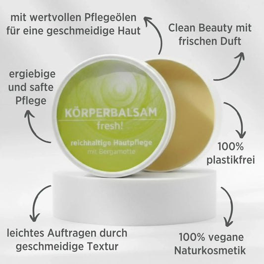 Körperbalsam mit natürlichen Inhaltsstoffen mit herrlichem Duft nach Bergamotte, Balsam ist in weißem, zylindrischem Karton verpackt mit gelbem Etikett. Die Vorteil des Balsams sind mit dunkler Schrift um das Produkt angeführt.