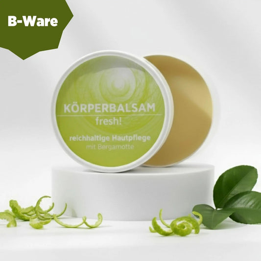Körperbalsam mit natürlichen Inhaltsstoffen mit herrlichem Duft nach Bergamotte, Balsam ist in weißem, zylindrischem Karton verpackt mit gelbem Etikett. B-Ware, Verpackung beschädigt.
